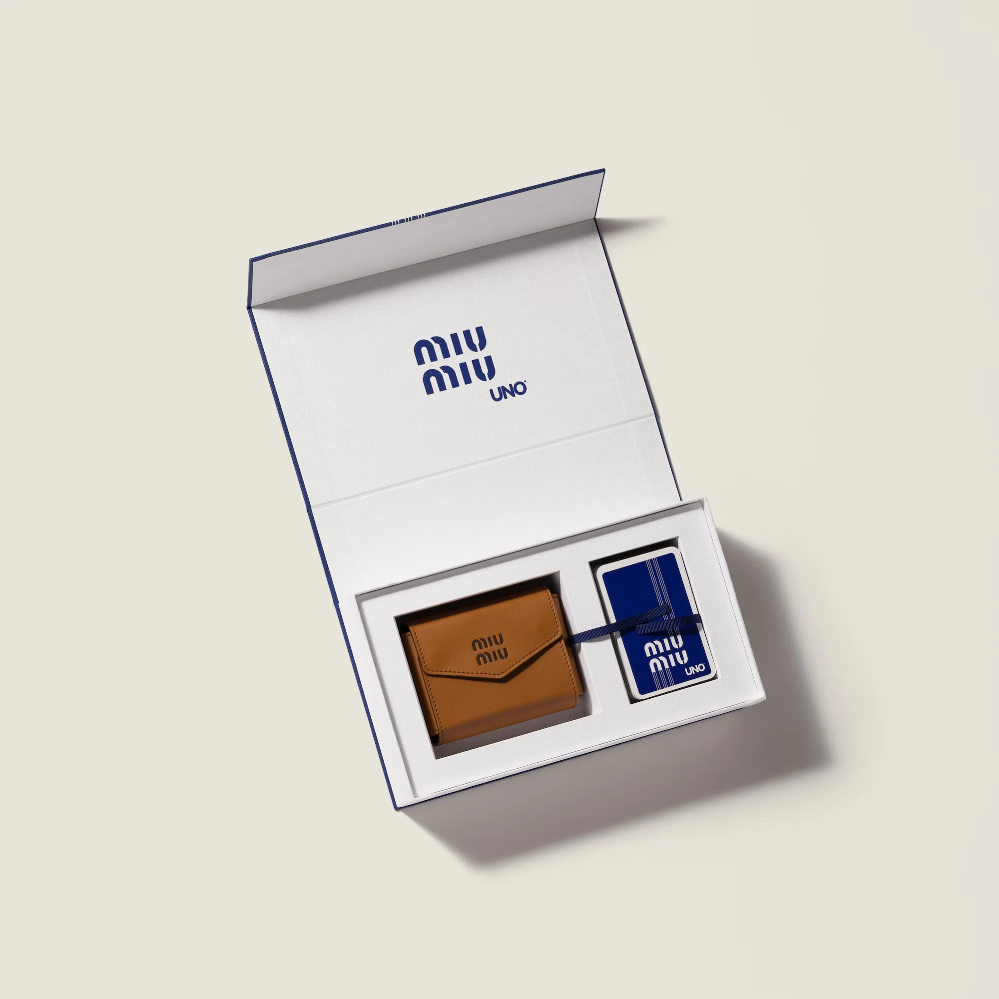 UNO x Miu Miu card set with a chic logo-embossed leather case